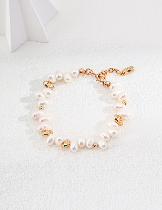 Vera Lustre | The "Ember" Baroque Pearl & Gold Nugget Bracelet handcrafted with 18K Gold Vermeil and natural freshwater pearls.
