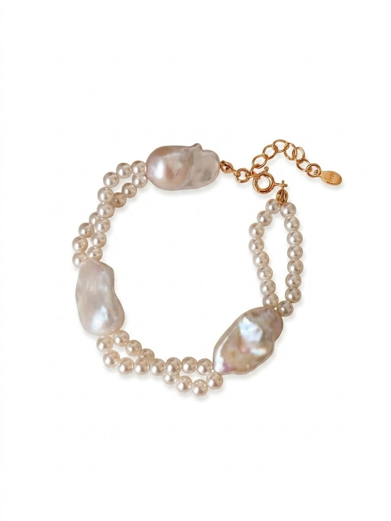 Vera Lustre | The "Isla" Dual-Layer Baroque & Seed Pearl Bracelet handcrafted with 18K Gold Vermeil and natural high-luster freshwater pearls on a clean white background.