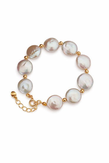 Vera Lustre "Selene" Coin Baroque Pearl Bracelet featuring iridescent flat pearls and 18K Gold Vermeil accents on a white background.