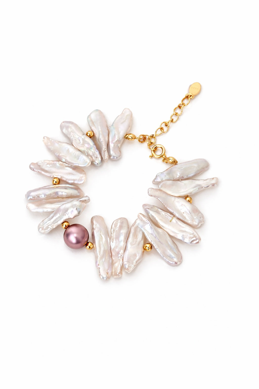 aroque freshwater pearl bracelet with gold accents and a pink pearl, high lustre irregular pearls on white background