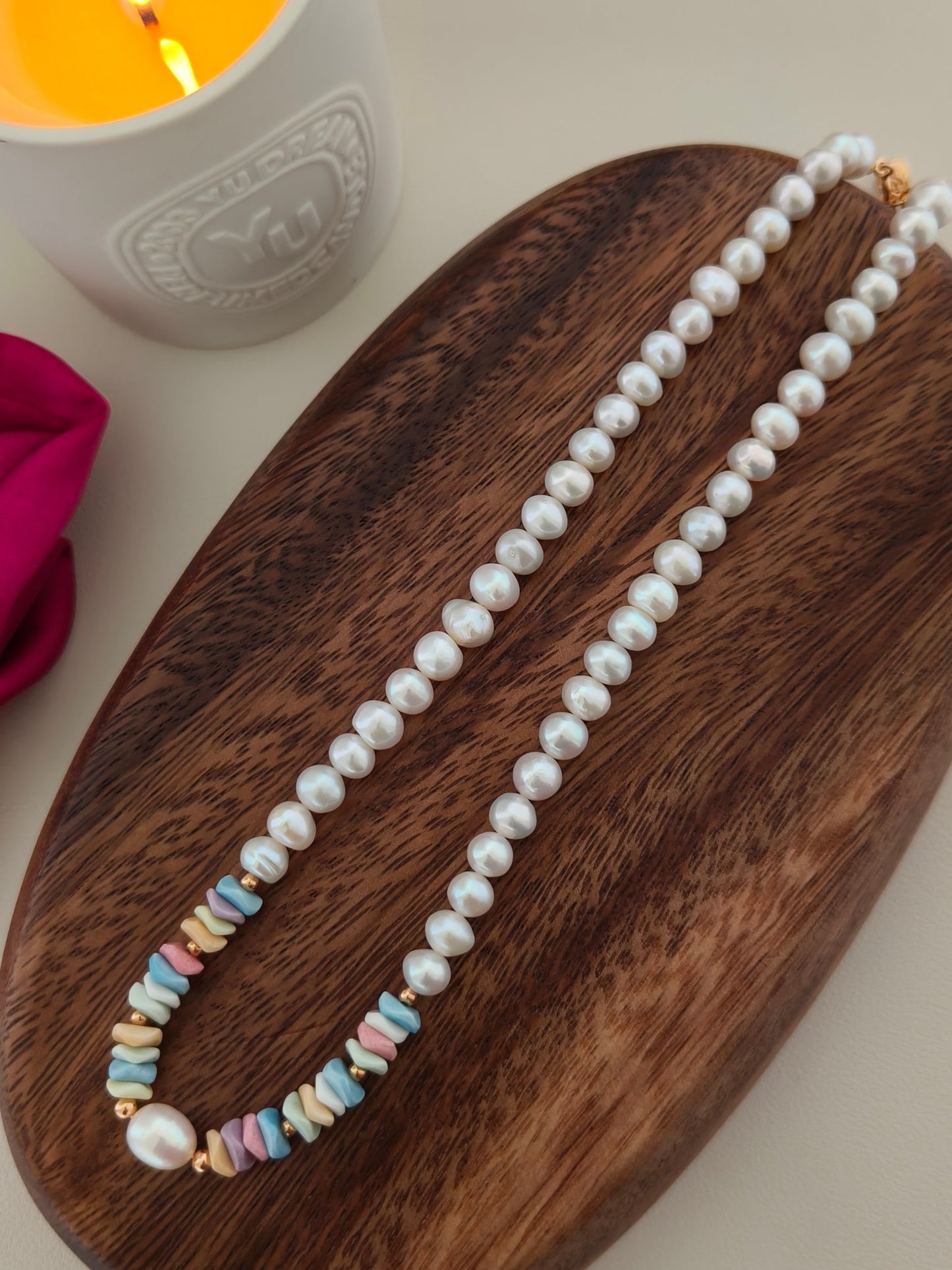 Macro shot of the iridescent luster and unique organic shapes of freshwater pearls in the Ondine collection.
