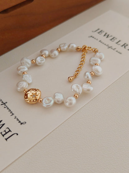 A close-up detail of the S925 sterling silver hallmark and the high-polish gold plating, emphasizing the premium material quality and durable craftsmanship.