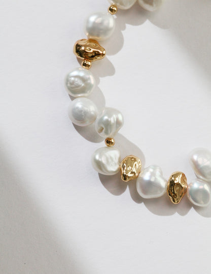 A focused view of the sculptural nugget links, highlighting the rich, matte vintage gold finish on the S925 sterling silver base. This visual reinforces the product's durability and artisanal craftsmanship, showcasing the refined, non-plated metallic glow and premium feel.