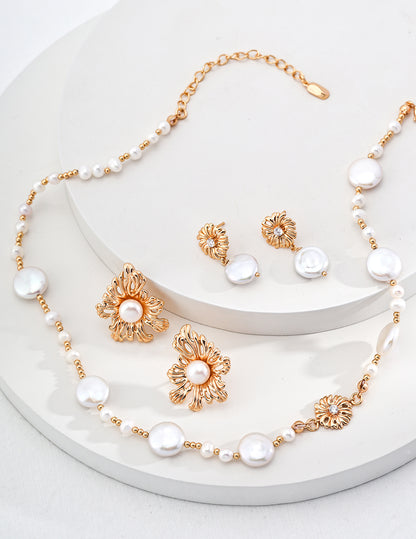 A curated flat lay of the Cressida jewelry set, featuring the matching necklace and bracelet. This image encourages coordinated luxury set purchases, highlighting the consistent design language of the Vera Lustre brand.