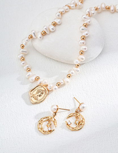 A curated flat lay of the Astra earrings paired with a matching star-motif necklace, ideal for customers looking for a complete celestial jewelry set for special occasions.