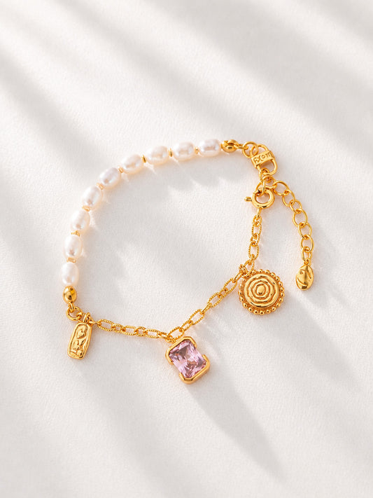 A professional studio shot of the Seraphina bracelet laid flat, showcasing the alternating pattern of shimmering CZ stones and high-orient natural pearls.