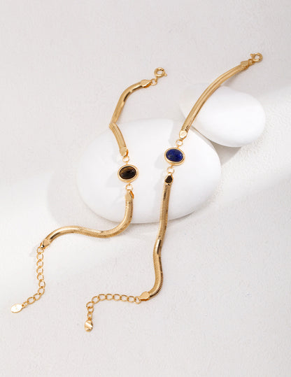 An overhead view of the bracelet fully unrolled, illustrating the high-quality S925 silver chain and the precision-cut oval gemstone settings.