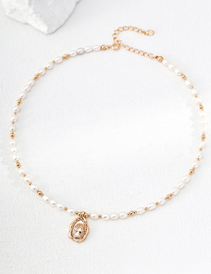 A high-contrast close-up of the Elara medallion, featuring the intricate Mother-of-Pearl inlay. This visual emphasizes the organic textures and the premium S925 sterling silver base, targeting customers looking for high-quality, artisan-crafted pearl jewelry with a nostalgic, vintage aesthetic.