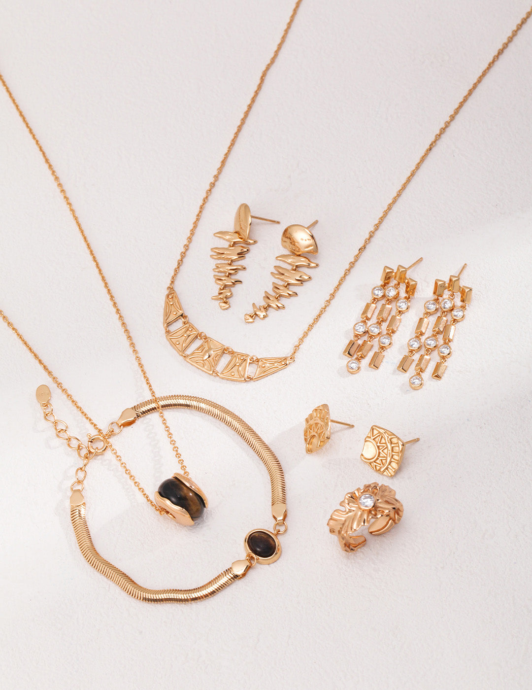 A curated photo of the Cyra matching jewelry set, featuring the bracelet and coordinating necklace to showcase a complete look of luxury and intention.