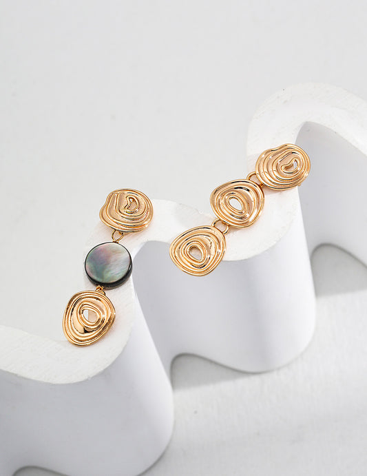A clean studio shot of the Nyx earrings, showcasing the vertical Black Mother-of-Pearl inlay and the precision-crafted S925 silver geometric frame.