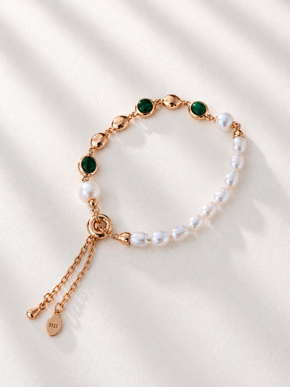 A clean studio shot of the Elowen bracelet, showcasing the high-polish 18K gold-plated link chain and the unique, one-of-a-kind textures of the natural gemstone.