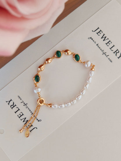 A side view of the bracelet laid flat, demonstrating the adjustable toggle/clasp and the elegant, minimalist silhouette of this healing stone jewelry piece.
