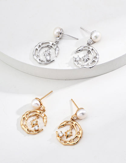 A side-by-side comparison of the Astra earrings in both Vintage Gold and Platinum Silver finishes, showcasing the premium S925 sterling silver craftsmanship.