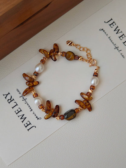 A side view of the bracelet laid flat, demonstrating the S925 hallmark and the elegant drape of the link chain with its adjustable extender.