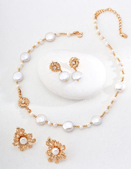 A curated flat lay featuring the Soleil earrings paired with a matching pearl necklace. This visual highlights a cohesive vintage-inspired jewelry set, perfect for bridal or special occasion gifting.