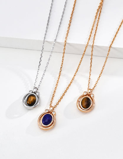 A curated flat lay featuring the Tiger’s Eye and Lapis Lazuli necklaces. This image showcases the vibrant blue and golden-brown textures of the natural stones, targeting searchers looking for meaningful gemstone jewelry and high-quality "luck-themed" luxury accessories for versatile daily wear.