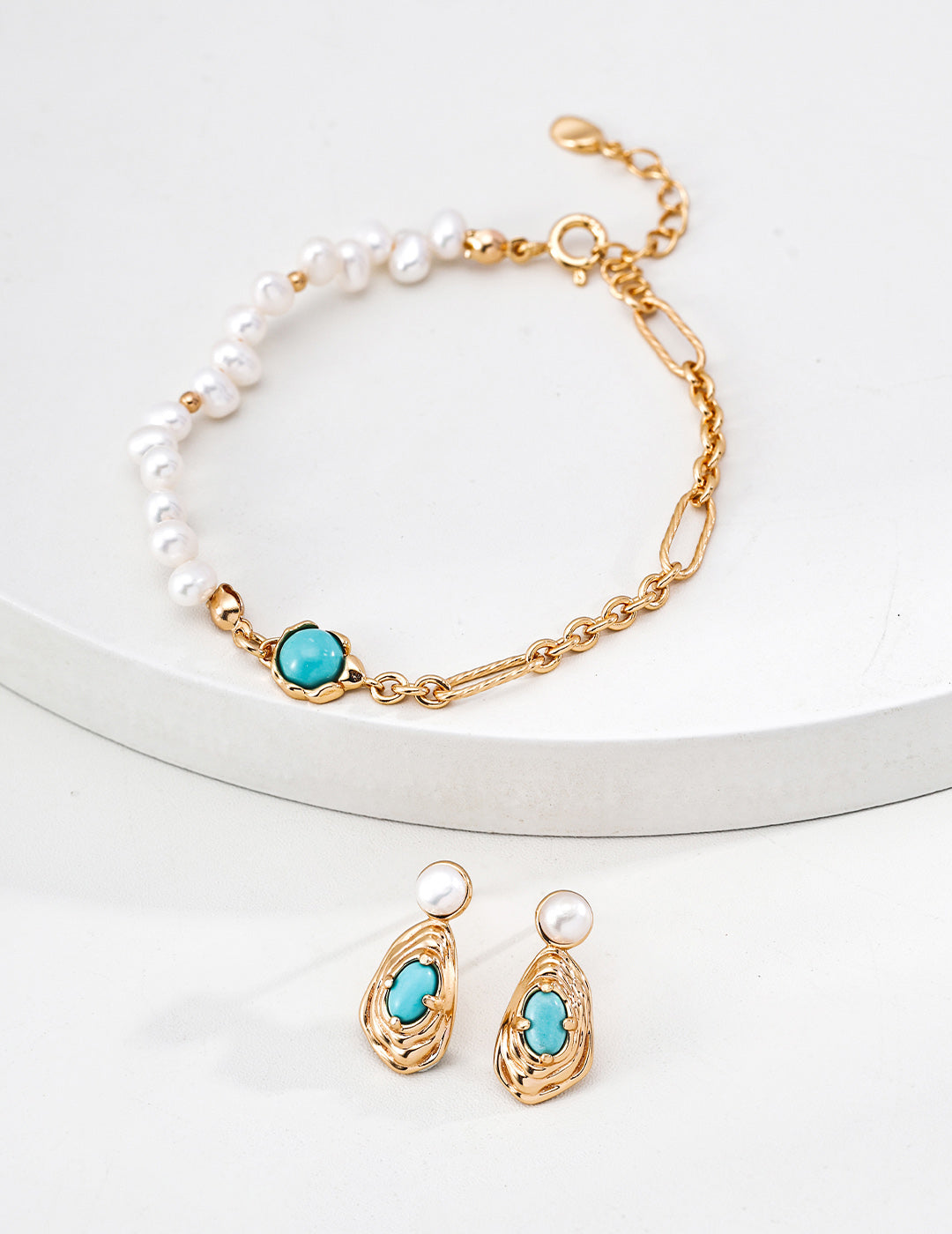 An overhead flat lay of the bracelet, illustrating the rhythmic arrangement of stones and the adjustable gold vermeil extension chain.