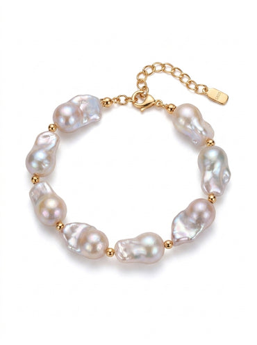 Vera Lustre "Luna" Bracelet featuring large, organic baroque pearls on a 925 sterling silver chain plated in 18K gold.
